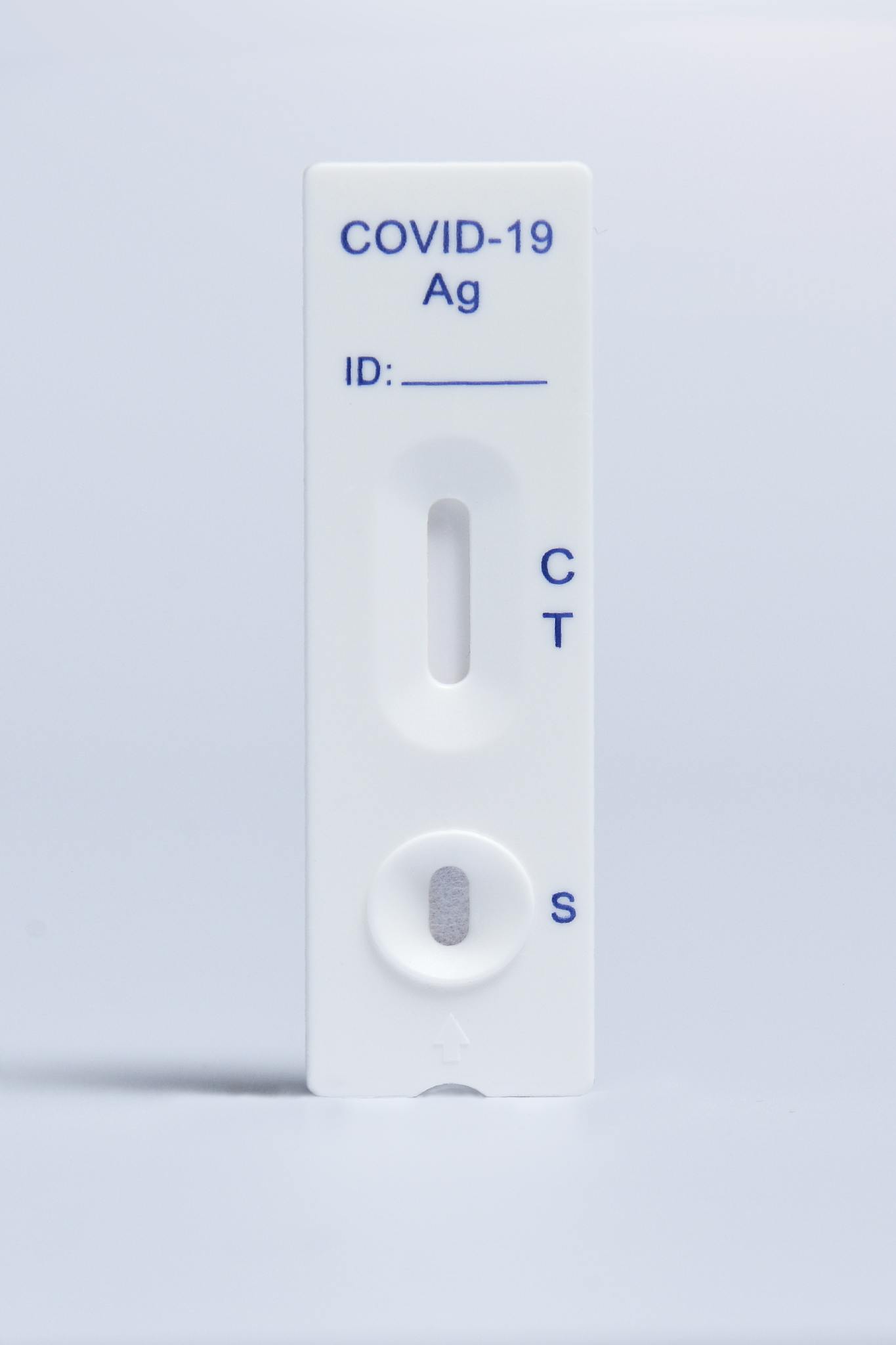 Close-up of COVID-19 antigen rapid test kit with clear indicator marks. Ideal for health and pandemic imagery.