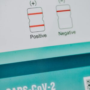 Photo by Diana ✨ Detailed view of a SARS-CoV-2 antigen rapid test kit with result indicators.